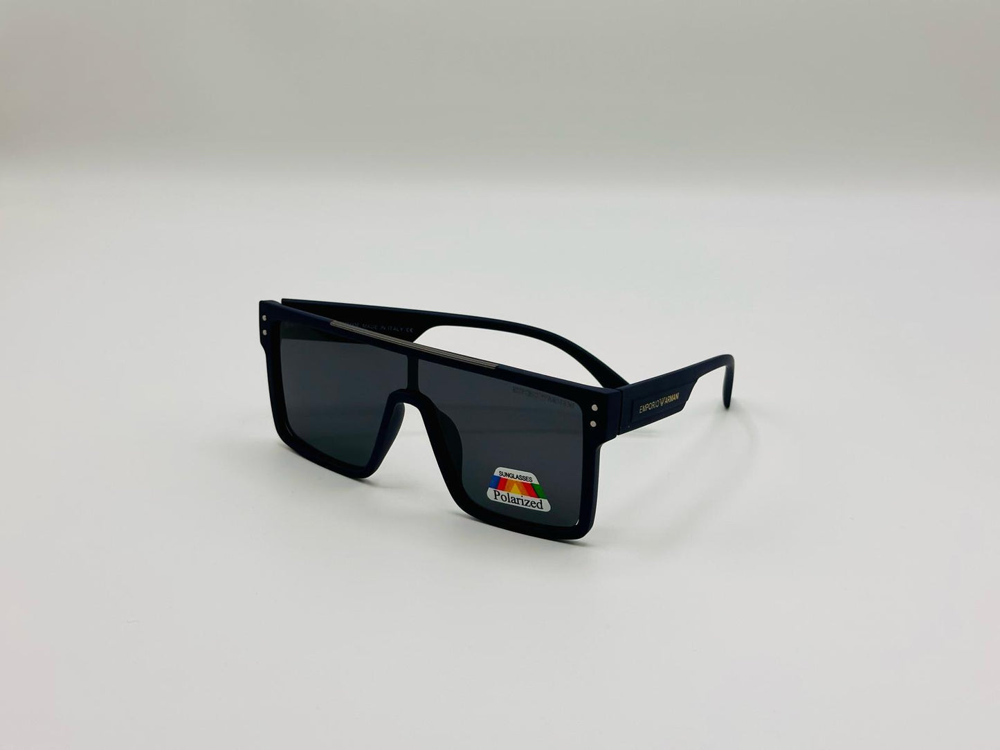 Black flat-top polarized shield sunglasses with dark lenses