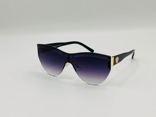 Cat-eye shield sunglasses with black frame, gold detail, and gradient purple lenses