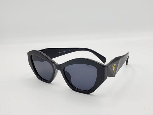 Black cat-eye sunglasses with thick frame and dark lenses on a white background