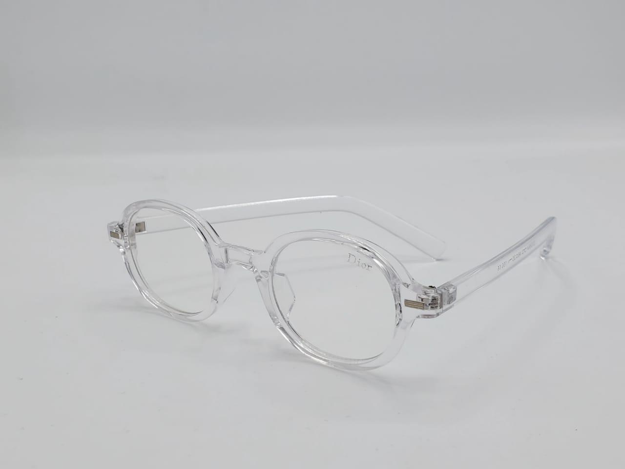 Transparent round eyeglass frame with clear arms and minimal design.