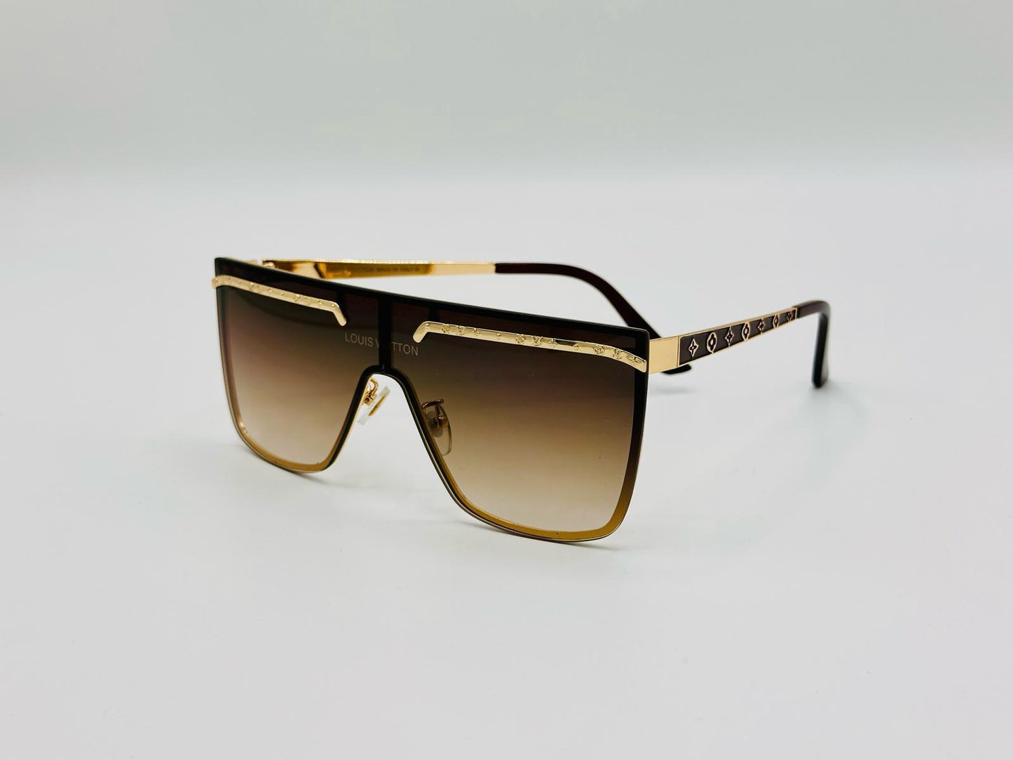 Cat-eye sunglasses with crystal-edged frames and gradient rose lenses