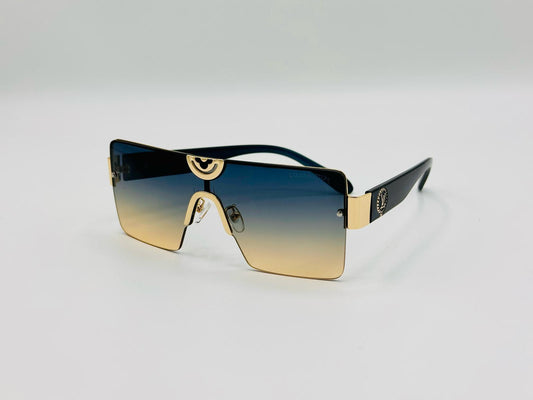 Oversized shield sunglasses with blue-to-gold gradient lens and gold detailing


