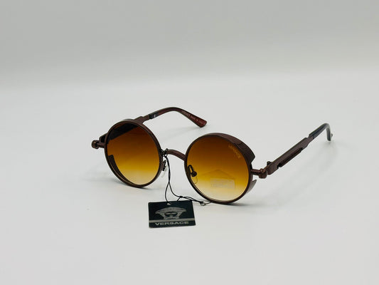 Retro round sunglasses with amber gradient lenses and brown metal frame