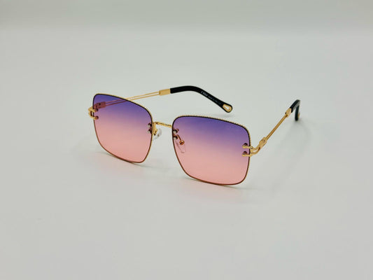 Gradient square sunglasses with pink-purple lenses and gold frame on white background